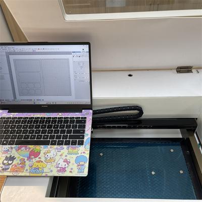 Máquina de corte a laser de proteção de tela de vidro temperado Daqin para loja de negócios online